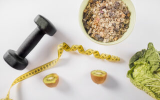 Vikt, måttband, grönsaker